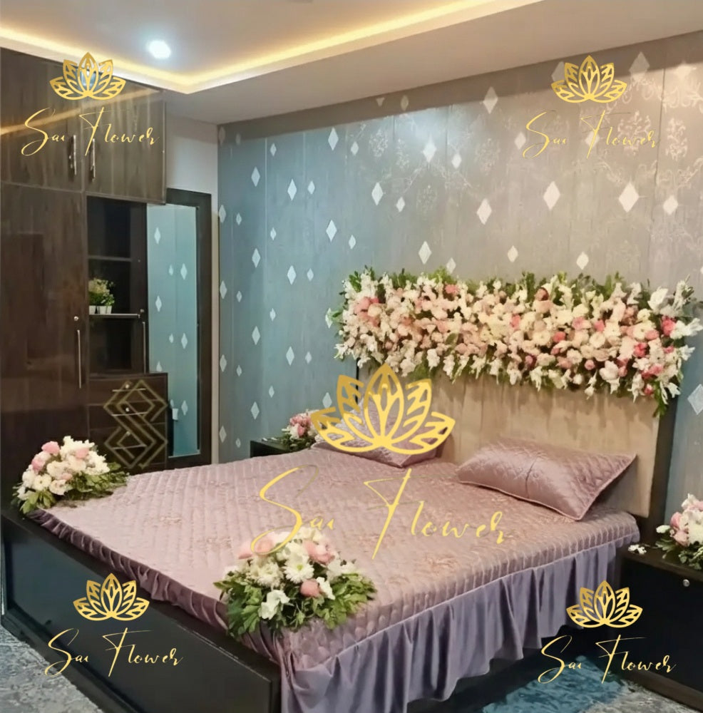 “Luxury pastel fresh flower bed decoration with roses, lilies, and carnations by SaiFlower – elegant setup for weddings and anniversaries”
