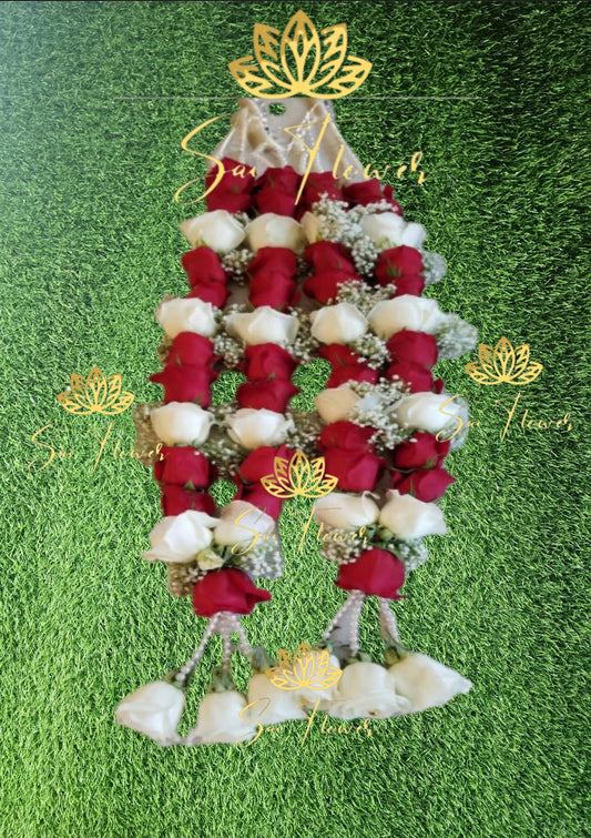 Decorative garland with red and white flowers on a green background