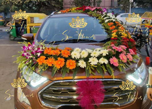 “Wedding car decoration with fresh mixed flowers – Sai Flower Delhi NCR. Luxury floral car décor with orchids, gerberas, and roses for wedding and reception cars.”