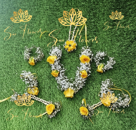 “Yellow and white fresh flower bridal jewellery set with necklace, earrings, maang tikka, and haathphool handcrafted by SaiFlower”