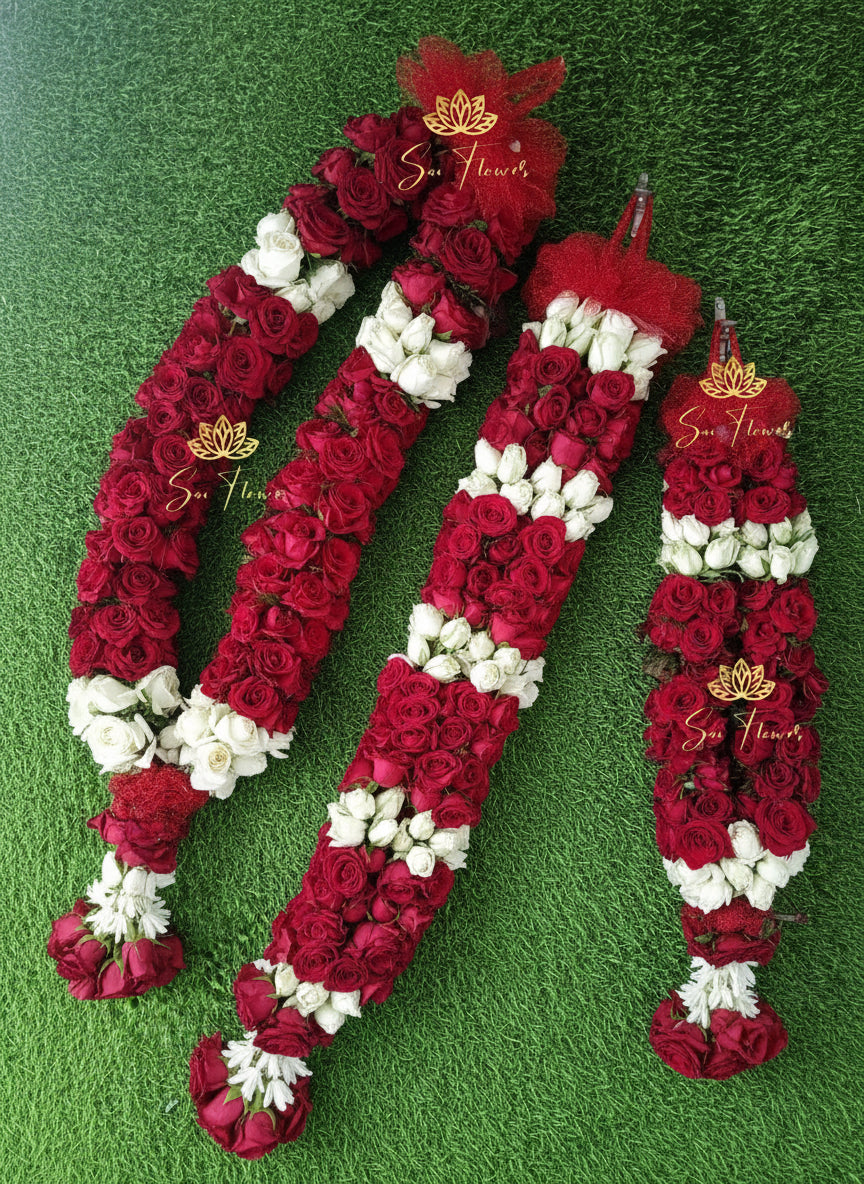 Two floral arrangements with red and white flowers on a green background, featuring 'Sue Flowers' logo.